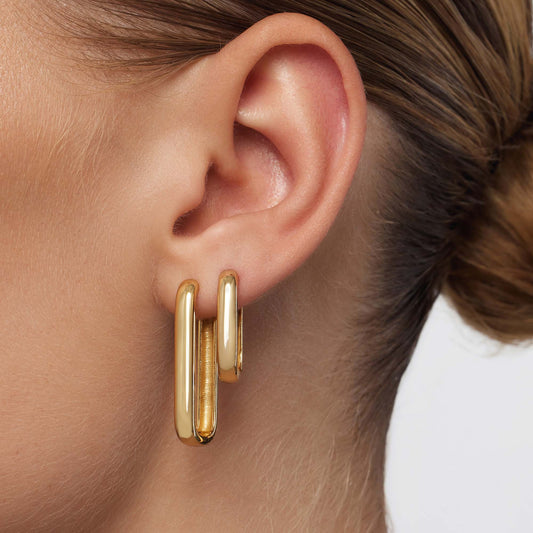 Large hoop earrings with icon